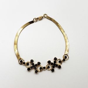 Black Crystals Golden Tone Bracelet